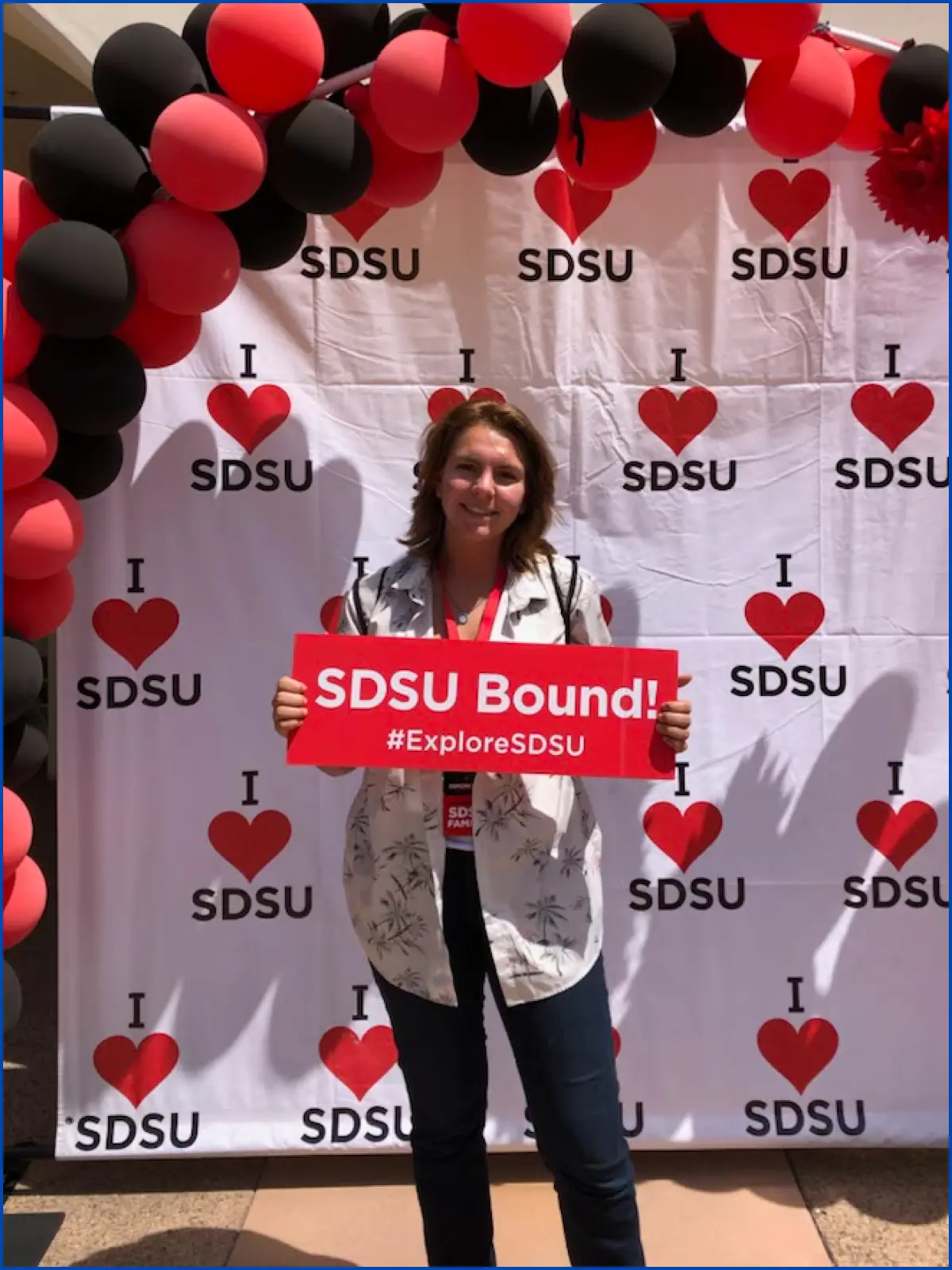 Adelina holding SDSU bound sign